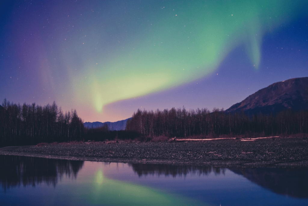 Aurora over lake in Alaska