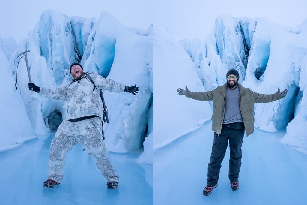 Phillip Flippo And Another Guy Standing On A Frozen Glacier Lake