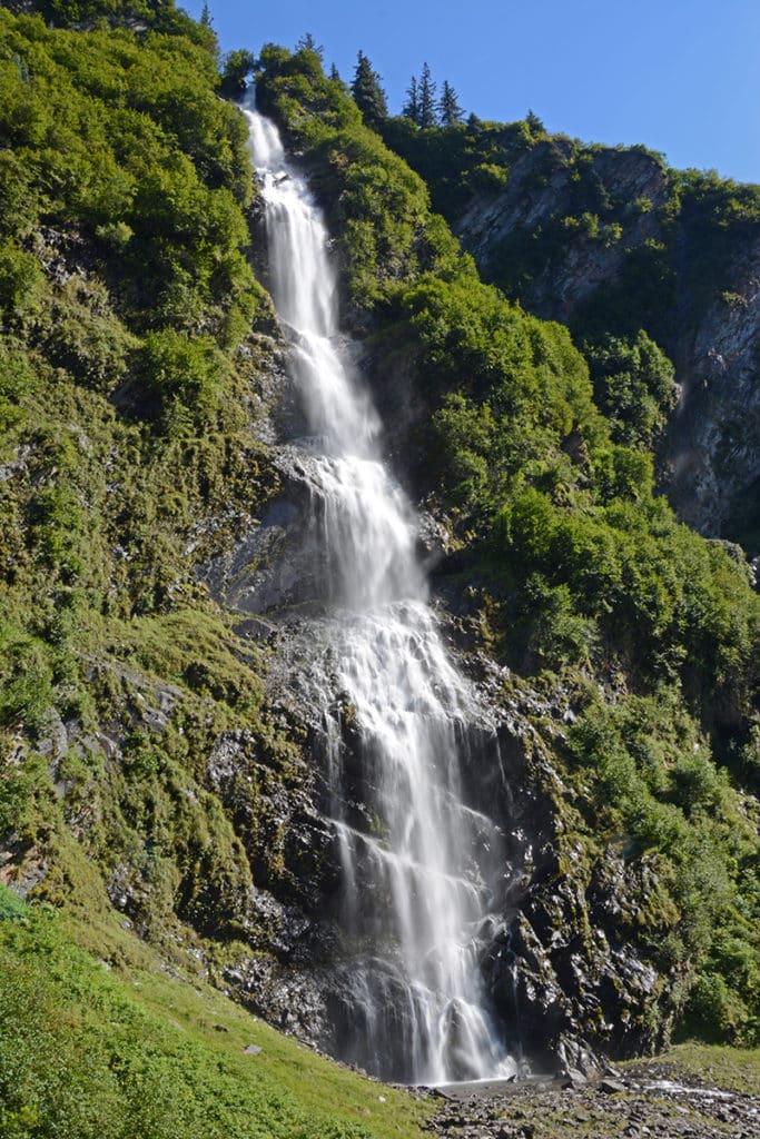 Bridal Veil Falls can be seen on the way to Valdez Alaska