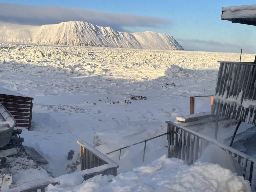 Looking out the door at Big Diomede Russia from Little Diomede United States