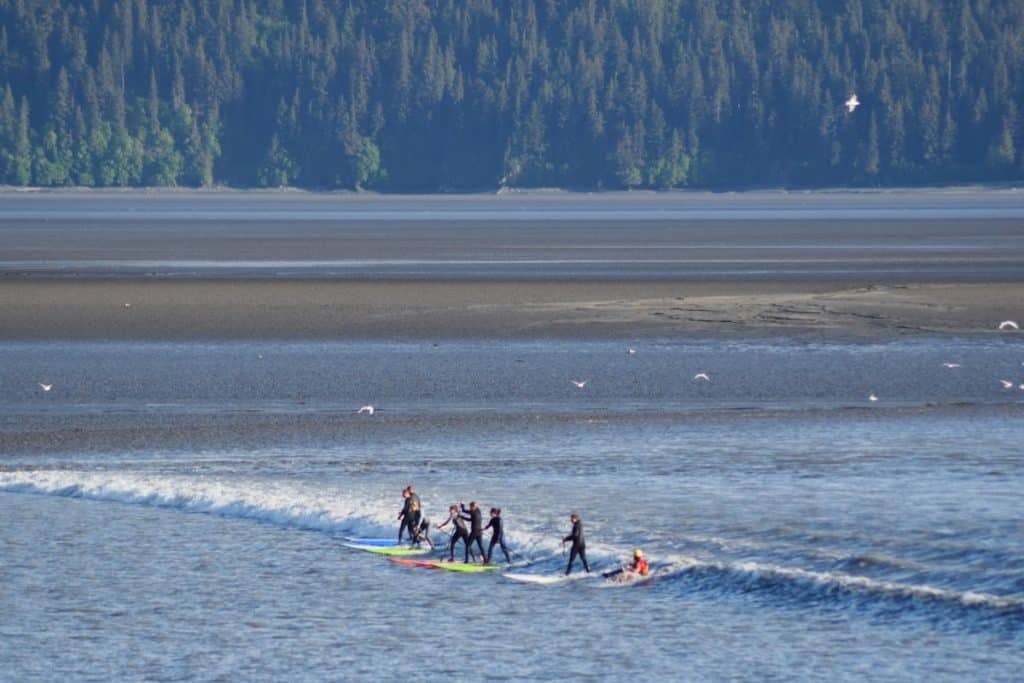 Bore Tide Surfers